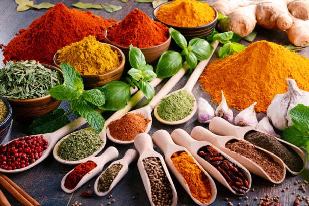 Founder sorting spices at the original counter